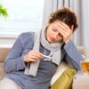 16311386 – sick woman with thermometer  headache  flu